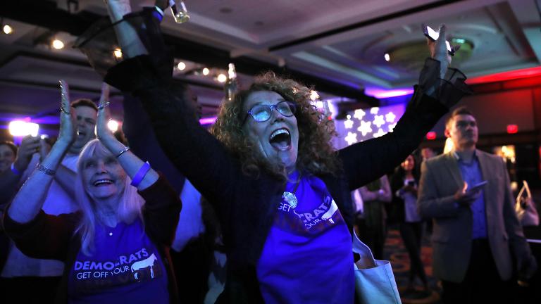 Sydney Crawford, 84, left, of New York City, and JoAnn Loulan, 70, of Portola Valley, Calif., watch election returns during a Democratic party election night event at the Hyatt Regency Hotel, on Tuesday, Nov. 6, 2018, in Washington. (AP Photo / Jacquelyn Martin)