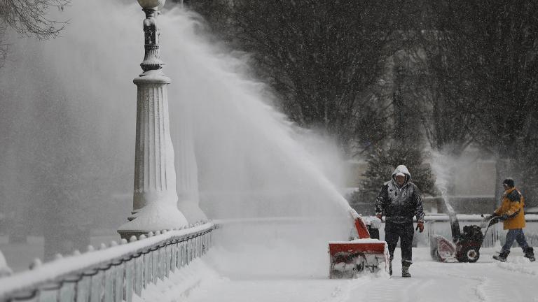 Snow-clearing efforts at Millennium Park following a snow storm on Saturday, Jan. 19, 2019. (Abel Uribe / Chicago Tribune via AP)