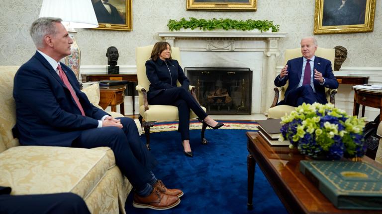 Speaker of the House Kevin McCarthy of Calif., left, and Vice President Kamala Harris listen as President Joe Biden speaks during a meeting with Congressional leaders in the Oval Office of the White House, Tuesday, May 16, 2023, in Washington. (AP Photo / Evan Vucci)