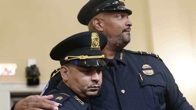 U.S. Capitol Police Sgt. Aquilino Gonell left, and U.S. Capitol Police Sgt. Harry Dunn stand after the House select committee hearing on the Jan. 6 attack on Capitol Hill in Washington, Tuesday, July 27, 2021. (AP Photo / Andrew Harnik, Pool)