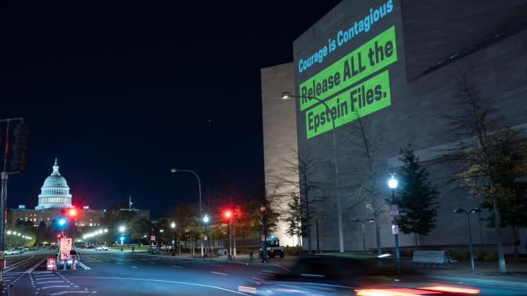 A World Without Exploitation projection is seen on the wall of the National Gallery of Art calling on Congress to vote yes on the Epstein files transparency act in Washington, Monday, Nov. 17, 2025. (AP Photo / Jose Luis Magana)