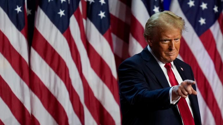 Republican presidential nominee former President Donald Trump points to the crowd at an election night watch party, Wednesday, Nov. 6, 2024, in West Palm Beach, Fla. (Julia Demaree Nikhinson / AP Photo)