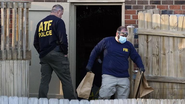 Investigators remove items from the basement of a home Saturday, Dec. 26, 2020, in Nashville, Tenn. (AP Photo / Mark Humphrey)