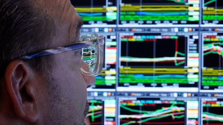 The monitor of specialist Anthony Matesic is seen through his glasses as he works on the floor of the New York Stock Exchange, Wednesday, Aug. 7, 2024. (AP Photo / Richard Drew)
