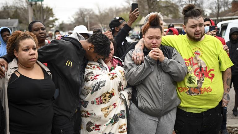 Family and friends of Daunte Wright, 20, grieve at 63rd Avenue North and Lee Avenue North hours after they say he was shot and killed by police, Sunday, April 11, 2021, in Brooklyn Center, Minn. Wright’s mother, Katie Wright, stands at center. (Aaron Lavinsky / Star Tribune via AP)