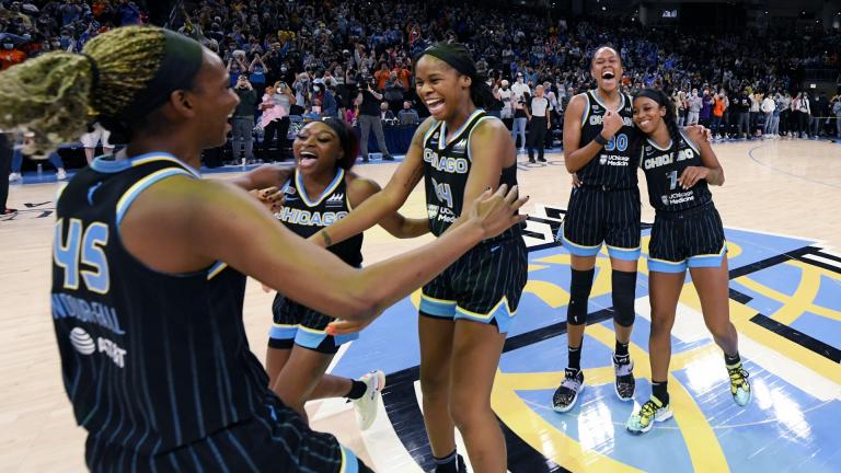 Chicago Sky players celebrate after defeating the Connecticut Sun 79-69 in Game 4 of a WNBA basketball playoff semifinal, Wednesday, Oct. 6, 2021, in Chicago. (AP Photo / Paul Beaty)