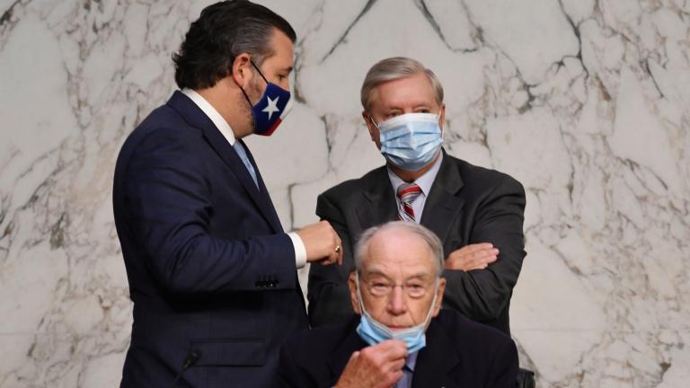 Committee Chairman Sen. Lindsey Graham, R-S.C., stands with Sen. Ted Cruz, R-Texas, left, in front of Sen. Chuck Grassley, R-Iowa, during the confirmation hearing for Supreme Court nominee Amy Coney Barrett, before the Senate Judiciary Committee, Thursday, Oct. 15, 2020, on Capitol Hill in Washington. (Kevin Dietsch / Pool via AP)