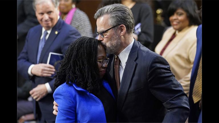 Supreme Court nominee Judge Ketanji Brown Jackson gets a kiss from her husband Dr. Patrick Jackson, at the conclusion of her confirmation hearing before the Senate Judiciary Committee on Capitol Hill in Washington, Wednesday, March 23, 2022. (AP Photo / Susan Walsh)