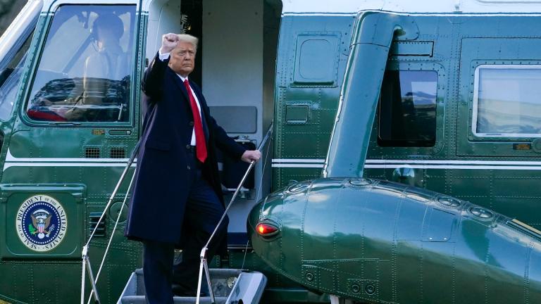President Donald Trump gestures as he boards Marine One on the South Lawn of the White House, Wednesday, Jan. 20, 2021, in Washington. Trump is en route to his Mar-a-Lago Florida Resort. (AP Photo / Alex Brandon)