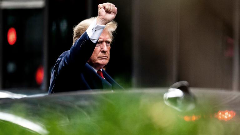Former President Donald Trump gestures as he departs Trump Tower, Wednesday, Aug. 10, 2022, in New York, on his way to the New York attorney general's office for a deposition in a civil investigation. (AP Photo / Julia Nikhinson)