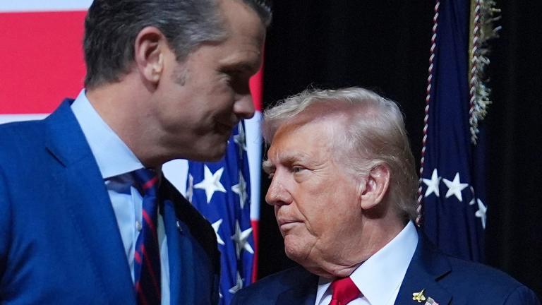 President Donald Trump is greeted by Secretary of Defense Pete Hegseth before speaking to a gathering of top U.S. military commanders at Marine Corps Base Quantico, Tuesday, Sept. 30, 2025, in Quantico, Va. (AP Photo / Evan Vucci)