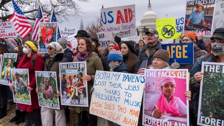 Demonstrators and lawmakers rally against President Donald Trump and his ally Elon Musk as they disrupt the federal government, including dismantling the U.S. Agency for International Development, which administers foreign aid approved by Congress, on Capitol Hill in Washington, Wednesday, Feb. 5, 2025. (J. Scott Applewhite / AP Photo)