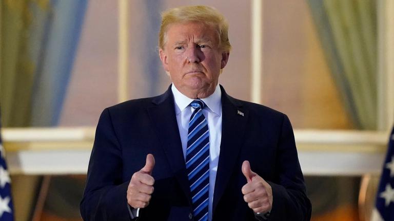 President Donald Trump stands on the balcony outside of the Blue Room as returns to the White House Monday, Oct. 5, 2020, in Washington, after leaving Walter Reed National Military Medical Center, in Bethesda, Md. (AP Photo / Alex Brandon) President Donald Trump stands on the balcony outside of the Blue Room as returns to the White House Monday, Oct. 5, 2020, in Washington, after leaving Walter Reed National Military Medical Center, in Bethesda, Md. (AP Photo / Alex Brandon)