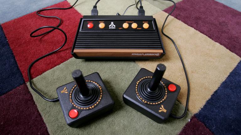 In this Sept. 15, 2005 file photo the new Atari Flashback 2 video game console is on display in San Francisco. (AP Photo / Paul Sakuma,File) In this Sept. 15, 2005 file photo the new Atari Flashback 2 video game console is on display in San Francisco. (AP Photo / Paul Sakuma,File)
