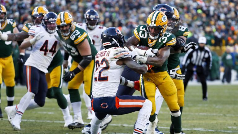 Green Bay Packers’ Aaron Jones runs for a touchdown during the second half of an NFL football game against the Chicago Bears Sunday, Dec. 15, 2019, in Green Bay, Wis. (AP Photo / Matt Ludtke