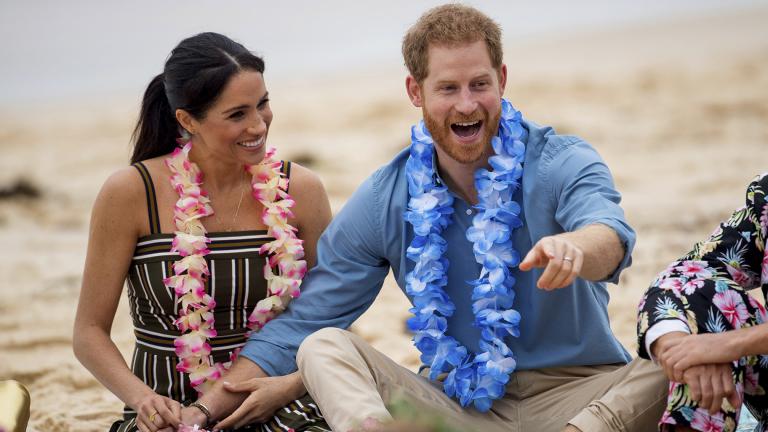 In this Friday, Oct. 19, 2018 file photo, Britain’s Prince Harry and Meghan, Duchess of Sussex, meet with a local surfing community group, known as OneWave, raising awareness for mental health and wellbeing in a fun and engaging way at Bondi Beach in Sydney, Australia. (Dominic Lipinski / Pool via AP)