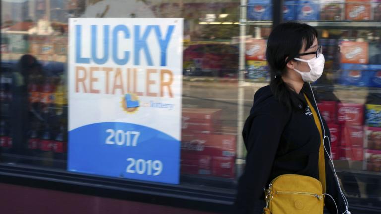 A pedestrian wears a protective mask in Alhambra, Calif., Friday, Jan. 31, 2020. (AP Photo / Damian Dovarganes) A pedestrian wears a protective mask in Alhambra, Calif., Friday, Jan. 31, 2020. (AP Photo / Damian Dovarganes)