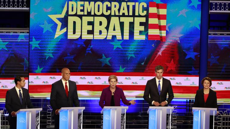 Democratic presidential candidate Sen. Elizabeth Warren, D-Mass., center, answers a question, during the Democratic primary debate hosted by NBC News at the Adrienne Arsht Center for the Performing Art, Wednesday, June 26, 2019, in Miami. Listening from left are, former Housing and Urban Development Secretary Julian Castro, Sen. Cory Booker, D-N.J., former Texas Rep. Beto O’Rourke, and Sen. Amy Klobuchar, D-Minn. (AP Photo / Wilfredo Lee)