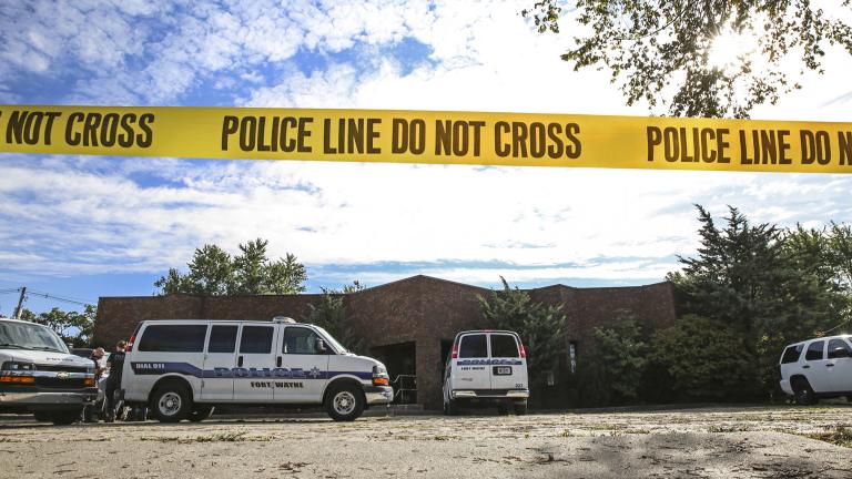 Officers from the Fort Wayne Police Department search the building that once housed an abortion clinic owned by Dr. Ulrich Klopfer on Thursday, Sept. 19, 2019, in Fort Wayne, Ind. (Eric Ginnard / The Herald-News via AP)