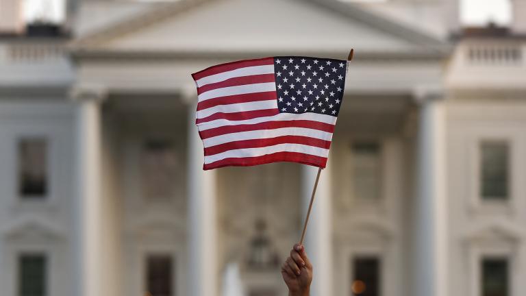 In this Sept. 2017 file photo, a flag is waved outside the White House, in Washington. (AP Photo / Carolyn Kaster)