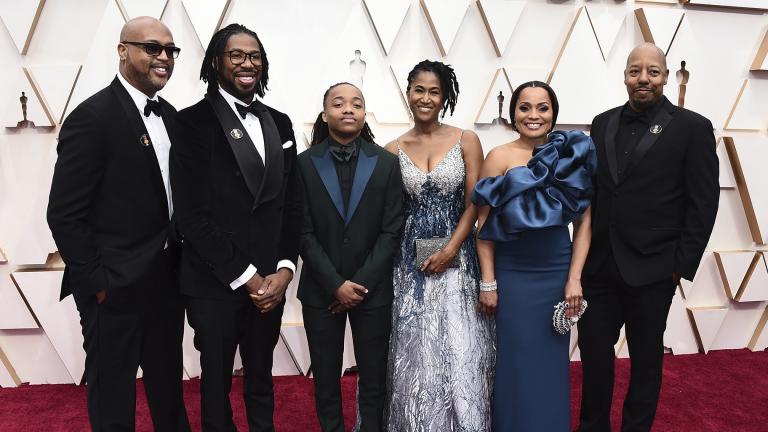 Matthew A. Cherry, from second left, Deandre Arnold, his mother Sandy Arnold, second right, and the cast and the crew of “Hair Love” arrive at the Oscars on Sunday, Feb. 9, 2020, at the Dolby Theatre in Los Angeles. (Photo by Jordan Strauss / Invision / AP)
