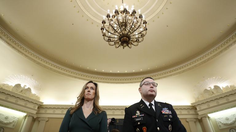 Jennifer Williams, an aide to Vice President Mike Pence, and National Security Council aide Lt. Col. Alexander Vindman stand as they take a break in hearing before the House Intelligence Committee on Capitol Hill in Washington, Tuesday, Nov. 19, 2019. (AP Photo / Andrew Harnik)