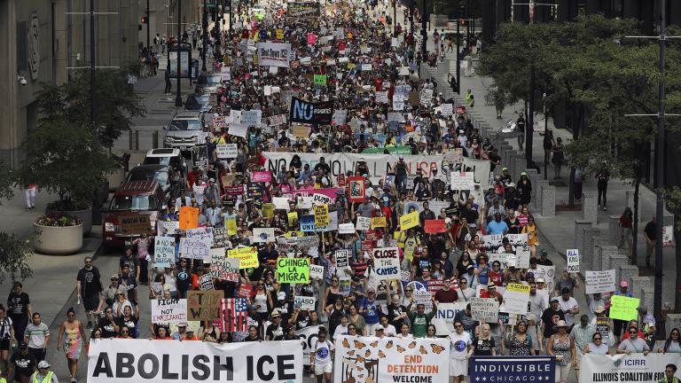 Thousands of people, including immigrants and their supporters, rally against President Donald Trump’s immigration policies as they march from Daley Plaza to the Chicago field office of Immigration and Customs Enforcement, Saturday, July 13, 2019, in Chicago. (Abel Uribe / Chicago Tribune via AP)