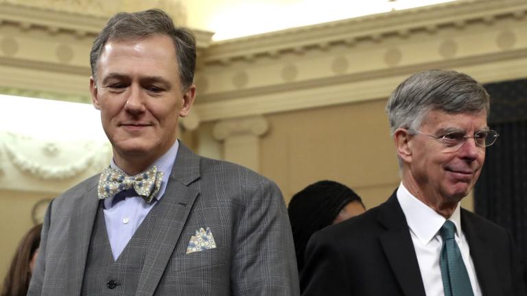 Top U.S. diplomat in Ukraine William Taylor, and career Foreign Service officer George Kent, left, walk back from a break as they testify before the House Intelligence Committee on Capitol Hill in Washington, Wednesday, Nov. 13, 2019, during the first public impeachment hearing of President Donald Trump’s efforts to tie U.S. aid for Ukraine to investigations of his political opponents. (AP Photo / Andrew Harnik)