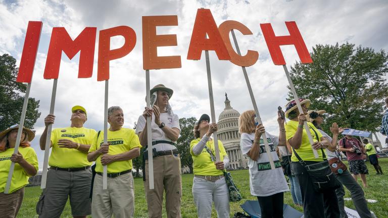 Activists rally for the impeachment of President Donald Trump at the Capitol in Washington on Thursday, Sept. 26, 2019. (AP Photo / J. Scott Applewhite)