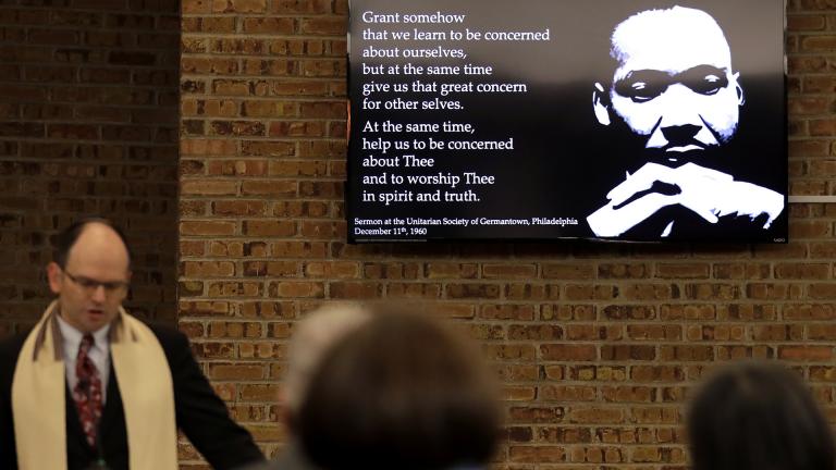 In this Jan. 17, 2020, photo Rabbi Fred Reeves, left, speaks during the Friday Shabbat Service at KAM Isaiah Israel in Chicago. (AP Photo / Nam Y. Huh)