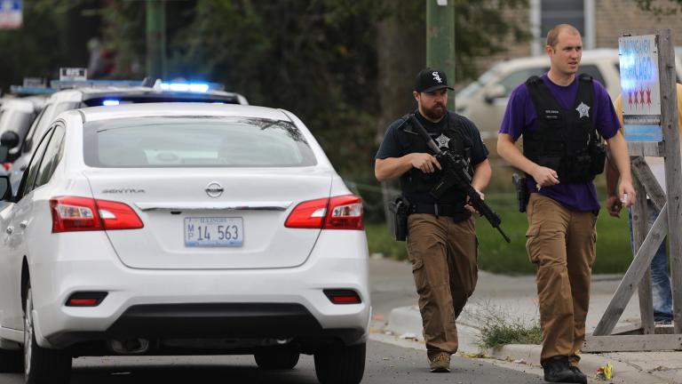 Police search for a suspect that shot a Chicago Police Department officer, near 63rd and Damen, Saturday, Sept. 21, 2019. The shooting happened around 8:40 a.m. (Abel Uribe / Chicago Tribune via AP) Police search for a suspect that shot a Chicago Police Department officer, near 63rd and Damen, Saturday, Sept. 21, 2019. The shooting happened around 8:40 a.m. (Abel Uribe / Chicago Tribune via AP)