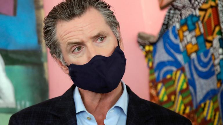 In this June 9, 2020, file photo, California Gov. Gavin Newsom wears a protective mask on his face while speaking to reporters at Miss Ollie's restaurant during the coronavirus outbreak in Oakland, Calif. (AP Photo / Jeff Chiu, Pool, File)