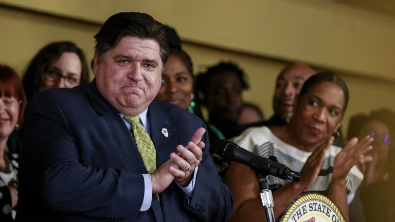 Gov. J.B. Pritzker takes in the applause before signing a bill that legalizes adult-use cannabis in the state of Illinois at Sankofa Cultural Arts and Business Center in Chicago. (AP Photo / Amr Alfiky) Gov. J.B. Pritzker takes in the applause before signing a bill that legalizes adult-use cannabis in the state of Illinois at Sankofa Cultural Arts and Business Center in Chicago. (AP Photo / Amr Alfiky)