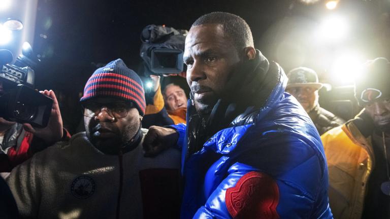 R. Kelly surrenders to authorities at Chicago First District police station on Friday, Feb. 22, 2019. (Tyler LaRiviere / Chicago Sun-Times via AP) R. Kelly surrenders to authorities at Chicago First District police station on Friday, Feb. 22, 2019. (Tyler LaRiviere / Chicago Sun-Times via AP)