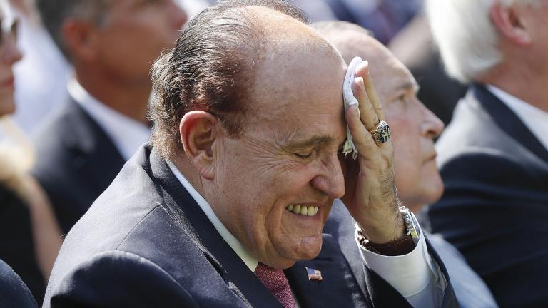 In this July 29, 2019 file photo, Rudy Giuliani, an attorney for President Donald Trump, wipes his forehead as he listens to Trump speak in the Rose Garden of the White House in Washington.  (AP Photo / Pablo Martinez Monsivais)