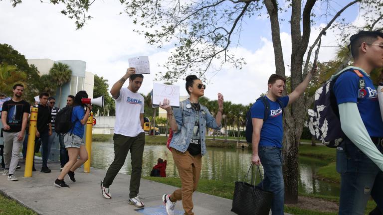 Students chant during the Bernie 2020 March to Early Vote at Florida International University to on Wednesday, March 11, 2020, in Miami. Florida and its 219 delegates could be the knockout punch for presidential hopeful Bernie Sanders after a dismal showing in the Michigan primary. (AP Photo / Brynn Anderson)