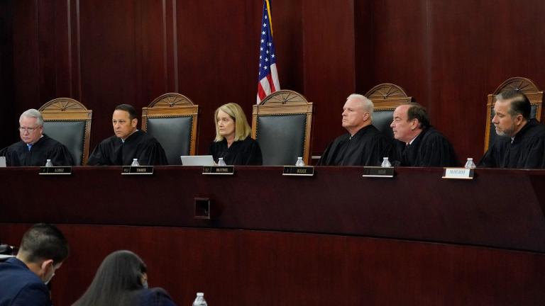 Arizona Supreme Court Justices from left; William G. Montgomery, John R Lopez IV, Vice Chief Justice Ann A. Scott Timmer, Chief Justice Robert M. Brutinel, Clint Bolick and James Beene listen to oral arguments on April 20, 2021, in Phoenix. (AP Photo / Matt York, File)