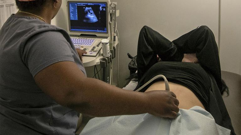 An operating room technician performs an ultrasound on a patient at an abortion clinic in Shreveport, La., Wednesday, July 6, 2022. The abortion bans taking effect after the nation's highest court overturned Roe v. Wade in June 2022 vary greatly in how they define when a pregnancy can be ended. (AP Photo / Ted Jackson)