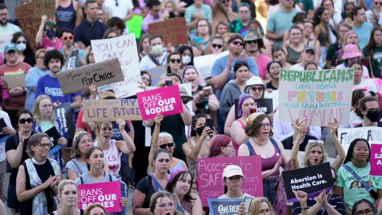 Abortion rights protesters attend a rally outside the state Capitol in Lansing, Mich., on June 24, 2022, following the United States Supreme Court's decision to overturn Roe v. Wade. (AP Photo / Paul Sancya, File)