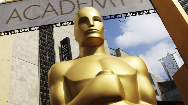 In this Feb. 21, 2015 file photo, an Oscar statue appears outside the Dolby Theatre for the 87th Academy Awards in Los Angeles. (Photo by Matt Sayles / Invision / AP, File)