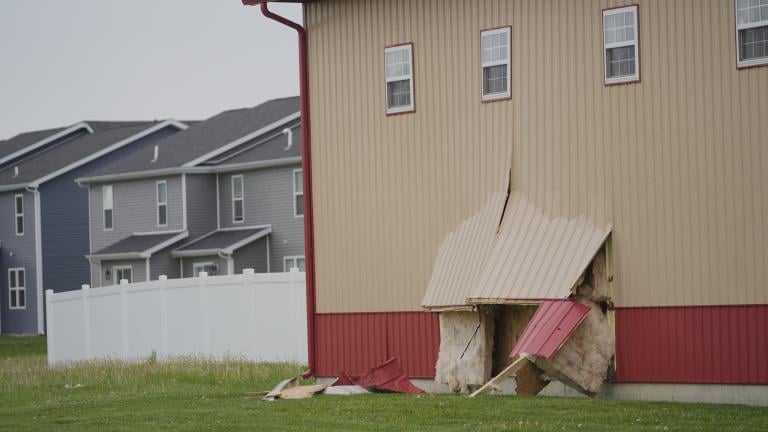Damage is visible at the scene after a car barreled through a building used for an after-school camp Tuesday, April 29, 2025, in Chatham, Ill. (AP Photo / Erin Hooley)