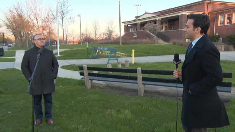 Ald. Gilbert Villegas, left, speaks with Paris Schutz during a live report for “Chicago Tonight.” (WTTW News)