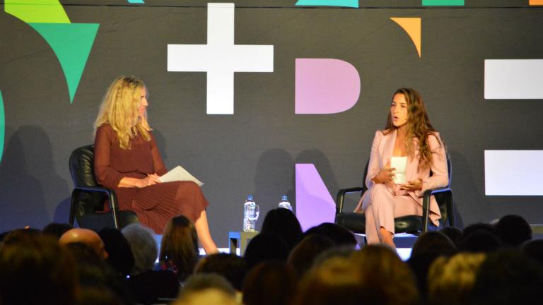 Olympic gymnast Aly Raisman, right, speaks with Chicago Tribune columnist Heidi Stevens on Tuesday, Sept. 18, 2018 during the Chicago Foundation for Women’s 33rd annual symposium. (Kristen Thometz / Chicago Tonight)