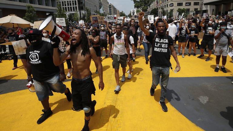 In this June 6, 2020, file photo, demonstrators protest near the White House in Washington over the death of George Floyd, a black man who was in police custody in Minneapolis. (AP Photo / Alex Brandon, File)