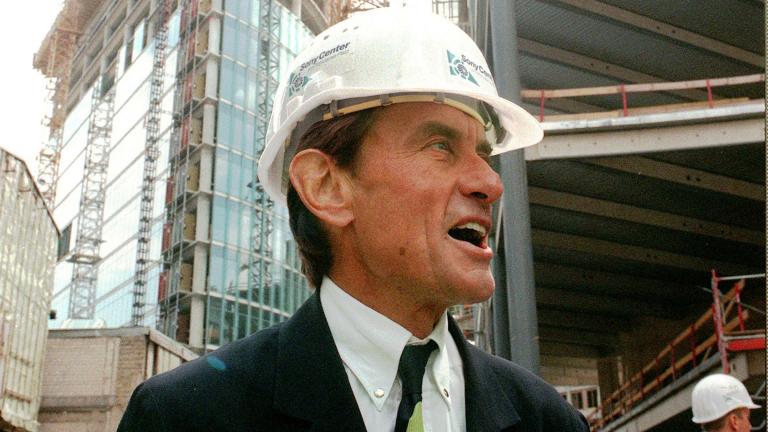 In this Wednesday, July 15, 1998 file photo, architect Helmut Jahn tours a construction site in Berlin. (AP Photos / Jockel Finck)