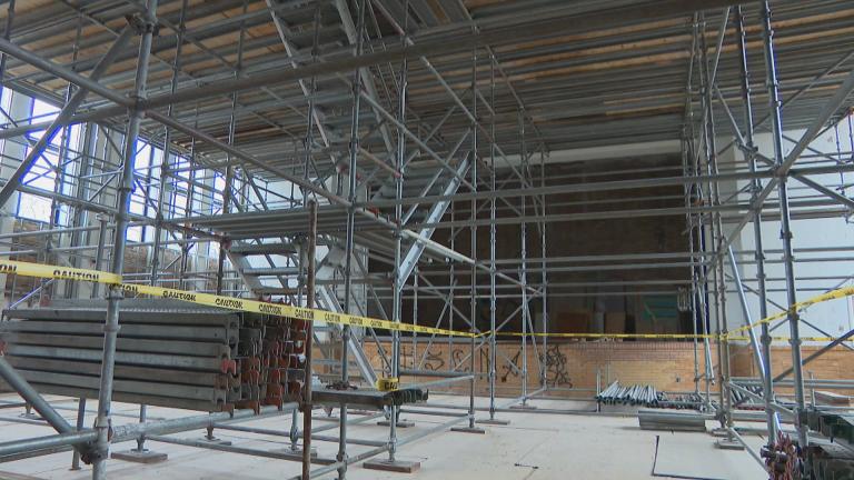 Work is underway at a former Catholic school in Greater Grand Crossing that Rebuild Foundation is turning into an arts incubator. (WTTW News)