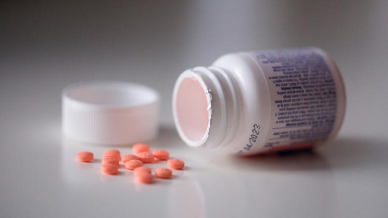 This photo shows a bottle of aspirin in the Brooklyn borough of New York. (AP Photo / Emma H. Tobin)