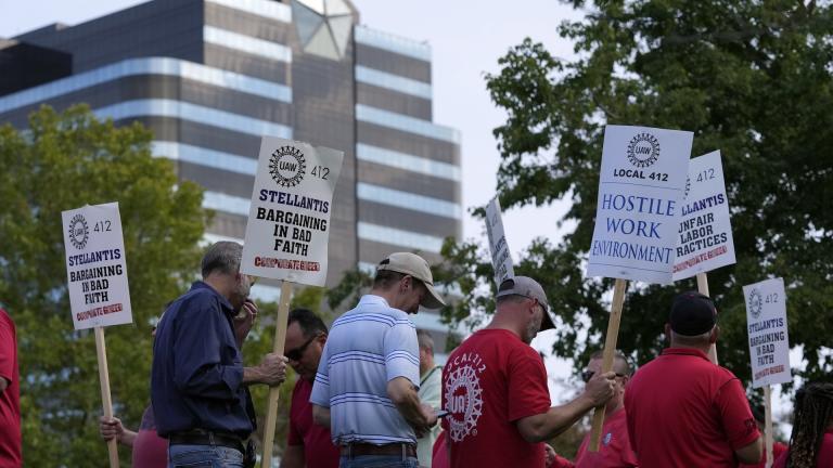 United Auto Workers march outside the Stellantis North American Headquarters, Wednesday, Sept. 20, 2023, in Auburn Hills, Mich. (AP Photo/Carlos Osorio)