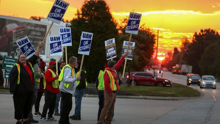 File - UAW local 862 members strike outside of Ford's Kentucky Truck Plant in Louisville, Ky. on Oct. 12, 2023. (Michael Clevenger / Courier Journal via AP, File)