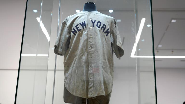 The 1932 Babe Ruth game worn New York Yankees World Series "Called Shot" jersey is displayed in a sealed glass box at Heritage Auction in Irving, Texas, Wednesday, Aug. 21, 2024. (AP Photo / LM Otero)